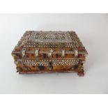 A small 19th Indian tortoiseshell and ivory overlaid box (for restoration) 15cm max