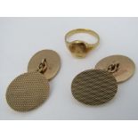 A pair of textured 9ct cufflinks and an unmarked signet ring, size H, 18g total