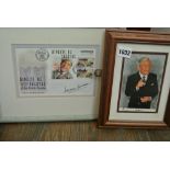 A quantity of framed memorabilia commemorating Sir Norman Wisdom OBE including signed photographs,