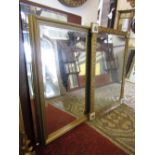 A pier mirror of rectangular form with bevelled edge plate within a moulded gilt frame with