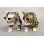 Two Winstanley models of tabby cats both washing their faces, with painted signature marks to