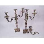 A pair of 19th century silver plated twin branch candelabra with S scrolled arms and cast rococo