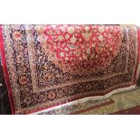 Modern Keshan type carpet on a red ground, 280 x 200 cm