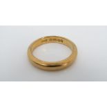 A 22ct wedding ring, size N, 6.5g