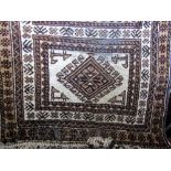 Persian style wool runner with white ground field and brown geometric colourway repeating detail,