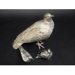 Cast silver plated cast figure of a pigeon together with two further smaller cast white metal birds