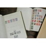 Three albums containing a quantity of British and worldwide stamps - early 20th century onwards,