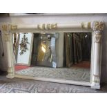 A 19th century overmantle mirror of rectangular form with bevelled edge plate, reeded slip and split