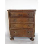 19th century mahogany and rosewood crossbanded apprentice chest of four long drawers upon bun feet