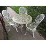 A Victorian style cast aluminium garden terrace table with decorative circular pierced scrolling