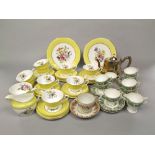 A collection of Royal Worcester Miranda pattern yellow ground tea wares including milk jug, sugar