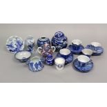 A collection of oriental ceramics including blue glazed tea wares modelled as water lily pads, a two