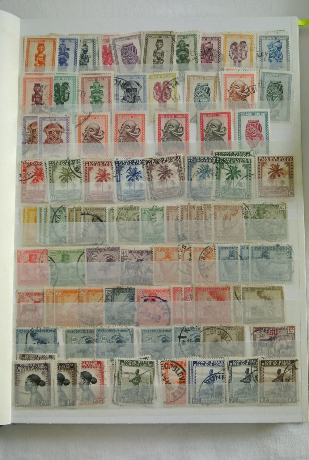Three stockbooks containing a large quantity of world stamps including French Colonies and Belgian