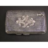 Continental silver filigree and diaper pierced cigarette case, with additional cast crest, 10 cm