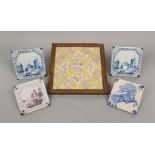 A set of four yellow ground tiles with painted manganese purple stylised floral and foliate