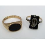 Two 9ct onyx rings comprising a gentleman's signet ring and the other with applied 'D' monogram with