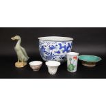 A collection of oriental ceramics including a 19th century white glazed libation type cup with