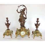 French three piece figural spelter clock garniture, the clock mounted by a nymph over a two train