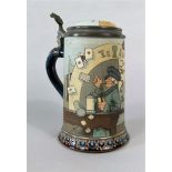 A late 19th century Mettlach Villeroy & Boch Stein with incised and painted humorous decoration