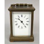 Brass carriage clock with cornice case, square enamelled dial with Roman numerals, 11 cm high