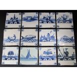 A collection of twelve 19th century tin glazed earthenware blue and white painted tiles, subjects