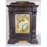 Impressive carved oak three train musical bracket/board room clock with gilt chapter ring and