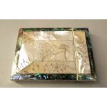 A Victorian mother of pearl card case with engraved floral and chinoiserie bird detail