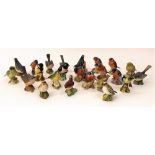 A collection of twenty various Beswick models of birds, together with two Royal Worcester birds