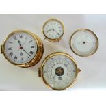 A collection of polished brass drum head type movements to include two clocks and two barometers