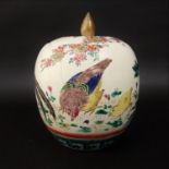 An early 20th century Satsuma jar and cover of ovoid form with a polychrome decoration of poultry