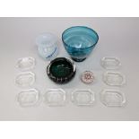 A collection of modern glassware to include a paperweight, three art glass vessels and a