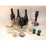 A quantity of antique glass ware to include two apothecary jars, three antique wine bottles, a