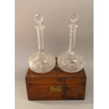 Pair of good quality cut glass bottle neck decanters; together with a further 19th century