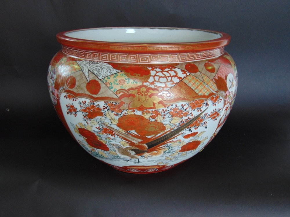 Chinese Kutani type porcelain jardiniere decorated in typical orange and gold with panels of birds