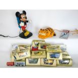 Two novelty telephones, one in the form of Mickey Mouse the other Garfield together with a