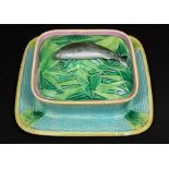 A 19th century majolica sardine dish and cover, probably by George Jones with naturalistically