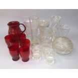 A good collection of cut glass to include a table lamp with shade, various vases and tumblers;