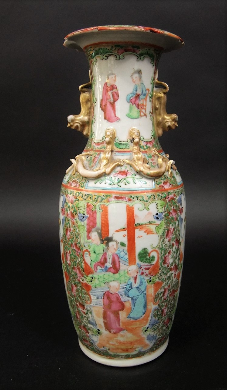 A Cantonese vase with painted and gilded female character decoration and glided dragon mounts, 26 cm