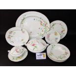 A quantity of early 20th century Royal Worcester dinner wares with printed and infilled floral