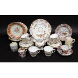 A collection of 19th century tea wares with painted floral sprays and gilt border decoration