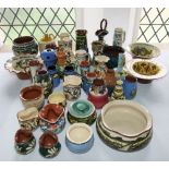 A quantity of Torquay wares including four open bowls of various design, a jug with pinched neck and