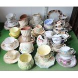 A collection of decorative tea wares including examples by Aynsley, Beswick, Tuscan china, etc,