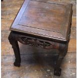 A pair of small Chinese hardwood occasional table of square cut form raised on shaped supports