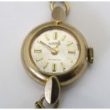 Vintage ladies 9ct Roamer cocktail watch, the champagne dial with gilt baton markers upon a 9ct