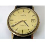 1970s 9ct Omega Geneve gentleman's wrist watch, the gilt dial with gilt baton markers and date