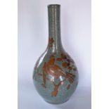 A Chinese celadon crackle glaze baluster vase with coppered enamel overlay, 32cm high