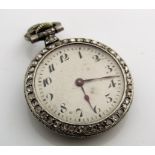 Ladies diamond fitted fob watch, the dial with Arabic numerals and diamond encrusted bezel, the back