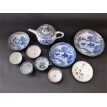 A collection of late 18th and early 19th century tea wares with blue and white chinoiserie