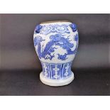 A large oriental vase with blue writhing dragon detail and moulded mask handles, 32cm tall