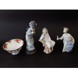 Three Lladro Daisa figure groups comprising a girl in Japanese style dress, children in night